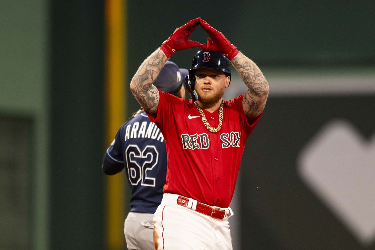 Alex Verdugo of the Boston Red Sox gestures after hitting a double in the third inning against the Tampa Bay Rays on September 27, 2023 at Fenway Park in Boston, Massachusetts.