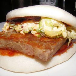 BBQ pork bun from Momofuku Ssam Bar by <a href="http://www.flickr.com/photos/37619222@N04/6406428355/in/pool-eater/">The Food Doc</a>. 