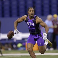 Utah defensive back Eric Rowe runs a drill at the NFL football scouting combine in Indianapolis, Monday, Feb. 23, 2015.