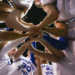 The Brigham Young Cougars huddle after defeating the St. Mary's Gaels 71-66 at the Marriott Center in Provo on Friday, Jan. 25, 2019.