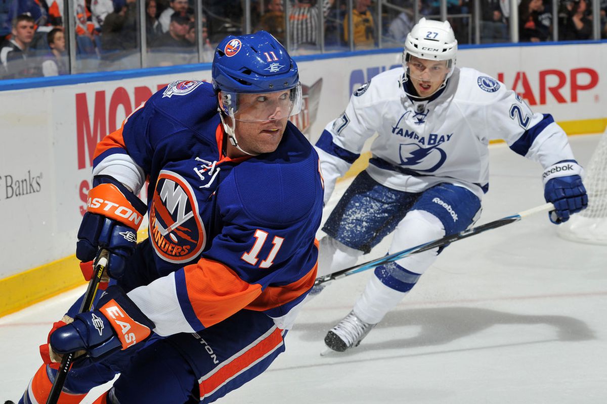Brian Rolston (11) of the New York Islanders  skates against Bruno Gervais (27) of the Tampa Bay Lightning during the second period at Nassau Coliseum on October 13, 2011 in Uniondale, New York. (Christopher Pasatieri/Getty Images)
