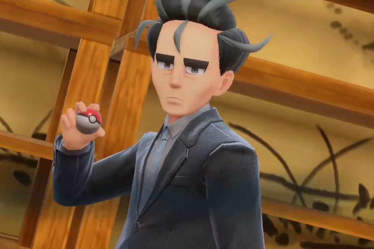 Larry, a tired looking man in a suit prepares to throw a Poké Ball