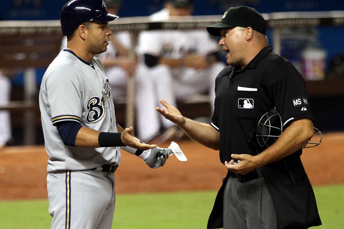 MIAMI, FL - SEPTEMBER 04:  Aramis Ramirez #16 of the Milwaukee Brewers argues with the home plate umpire against the Miami Marlins at Marlins Park on September 4, 2012 in Miami, Florida.  (Photo by Marc Serota/Getty Images)