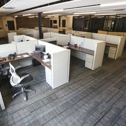 Cubicles that will house caseworkers and other service providers fill one of the rooms on the ground floor of the new Gail Miller Resource Center in Salt Lake City on Friday, Sept. 6, 2019.