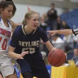 Skyline's Madison Grange handles the ball while guarded by Timpview's Jasmine Espinoza during Timpview's 56-49 win over Skyline in the Class 5A state semifinals at Salt Lake Community College in Taylorsville on Friday, Feb. 23, 2018.