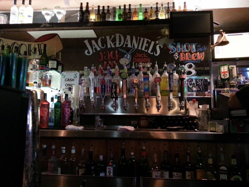 Taps and mixers with a Jack Daniel’s flag. 