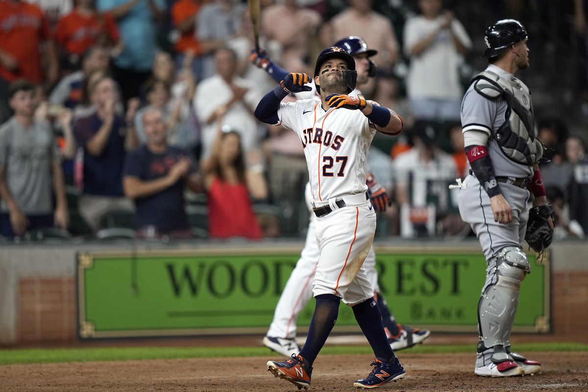 The Astros’ Jose Altuve celebrates after hitting a home run against the White Sox during the sixth inning Thursday night. 