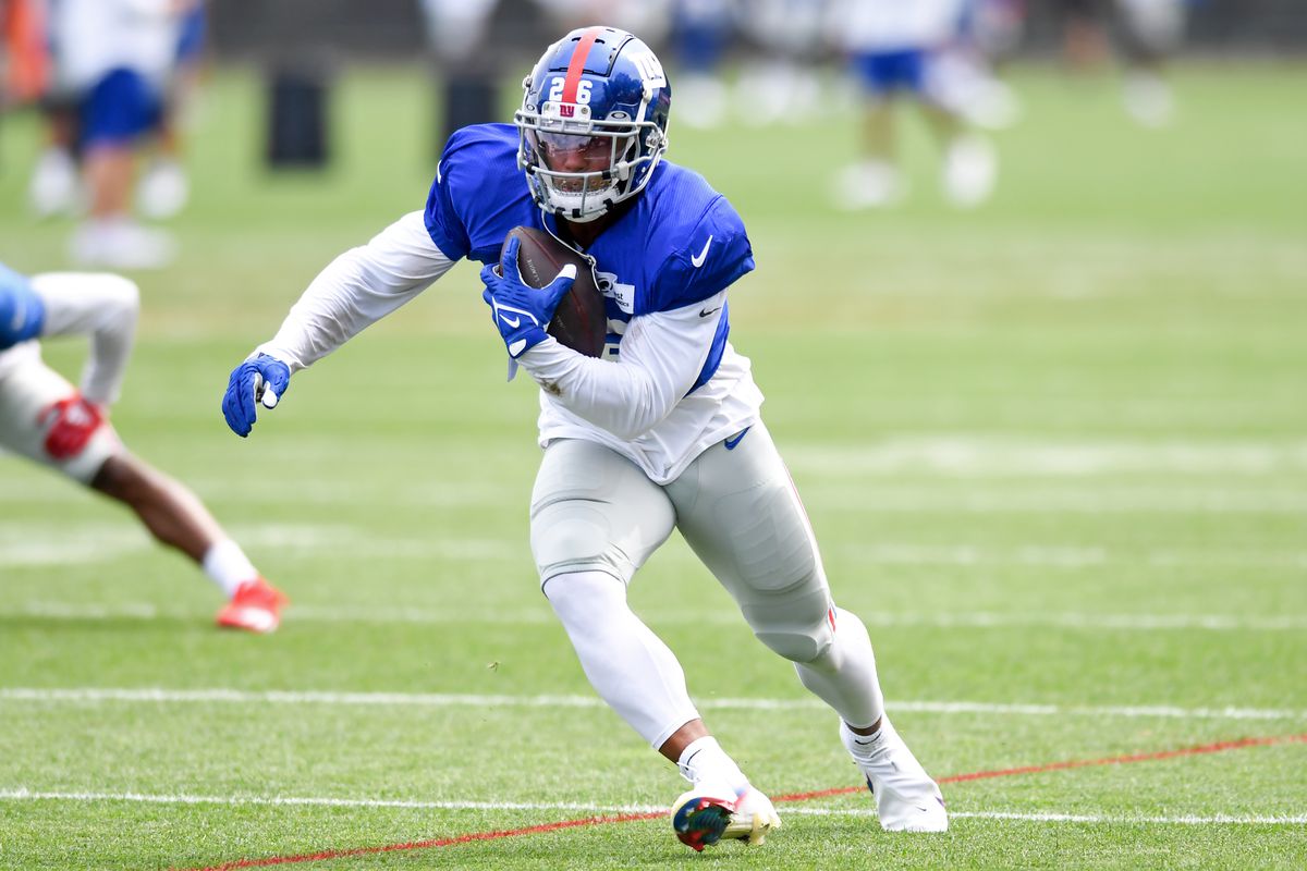 Running back Saquon Barkley #26 of the New York Giants runs a drill during a joint practice with the Cleveland Browns on August 19, 2021 in Berea, Ohio.