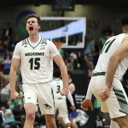 Utah Valley Wolverines guard Connor Harding (15) screams after scoring in the game against BYU at Utah Valley University in Orem on Wednesday, Dec. 1, 2021.