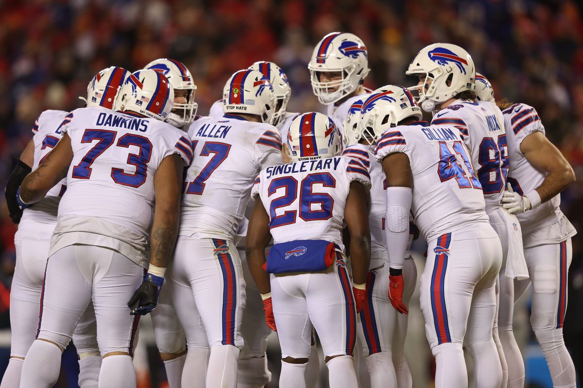 Buffalo Bills offensive players huddle on the field during the game against the Kansas City Chiefs in the AFC Divisional Playoff game at Arrowhead Stadium on January 23, 2022 in Kansas City, Missouri.