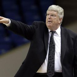 Utah State head coach Stew Morrill directs his team during the first half of an NCAA college basketball game against San Jose State Wednesday, Feb. 18, 2015, in San Jose, Calif. (AP Photo/Marcio Jose Sanchez)