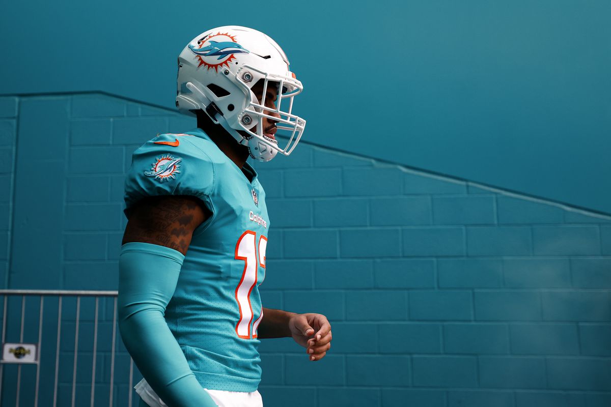 Jaylen Waddle #17 of the Miami Dolphins stands in the tunnel prior to an NFL football game against the New York Jets at Hard Rock Stadium on January 8, 2023 in Miami Gardens, Florida.