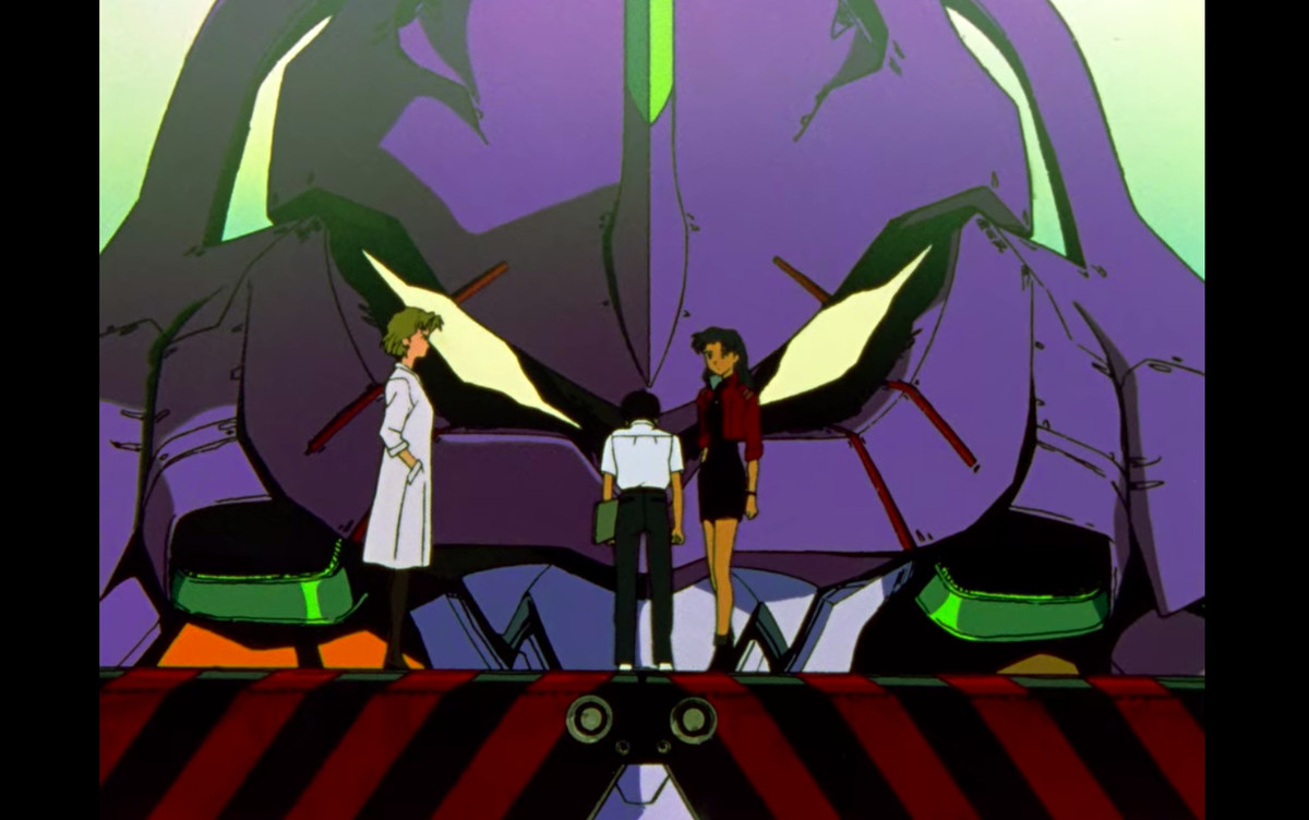 Characters stand in front of a mechanized fighter