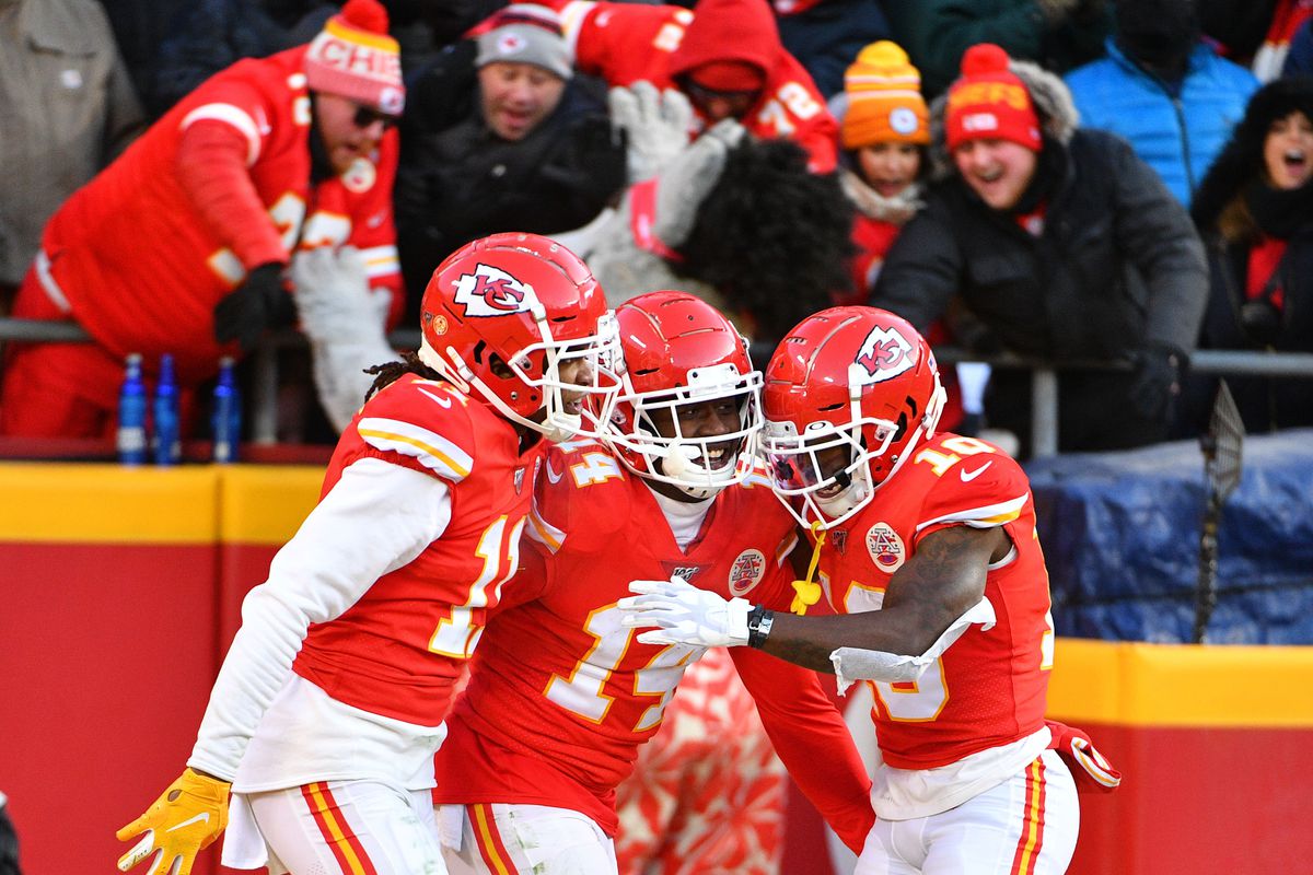 Kansas City Chiefs wide receiver Sammy Watkins celebrates with wide receiver Demarcus Robinson and wide receiver Tyreek Hill after scoring during the AFC Championship Game against the Tennessee Titans at Arrowhead Stadium.