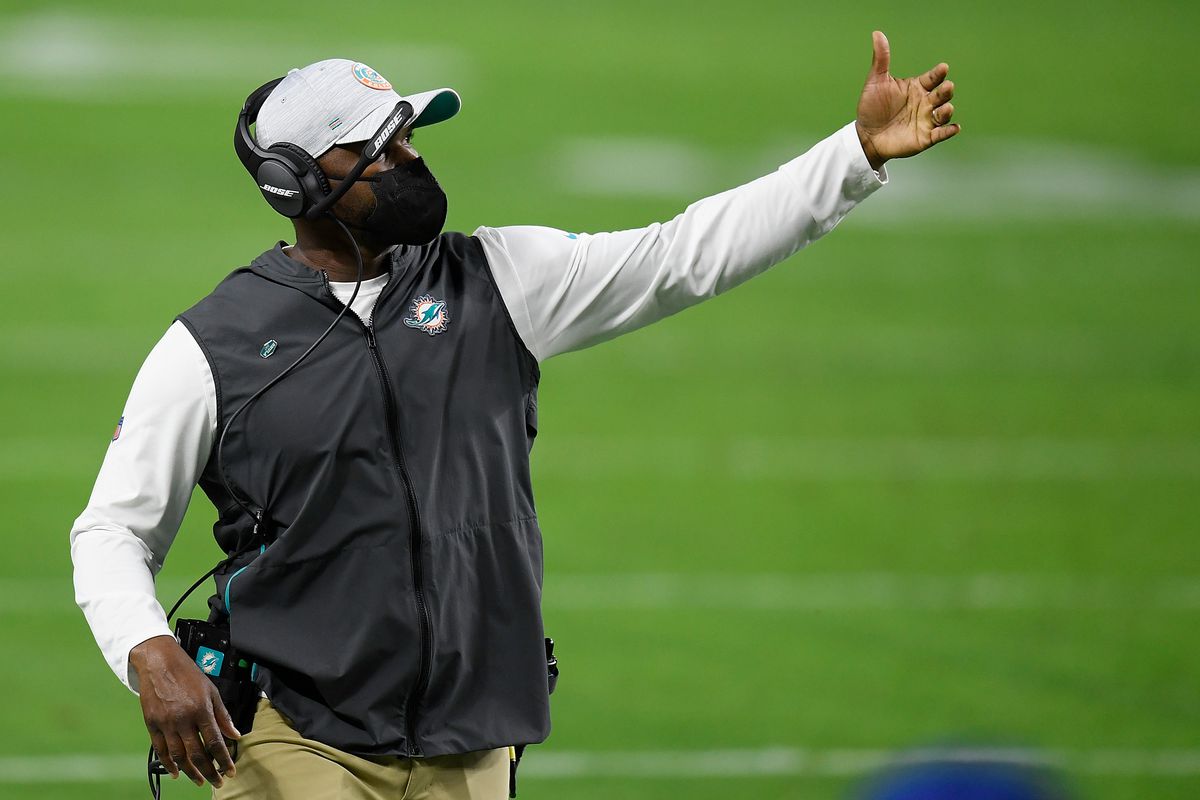 Head coach Brian Flores of the Miami Dolphins watches action during a game against the Las Vegas Raiders at Allegiant Stadium on December 26, 2020 in Las Vegas, Nevada.