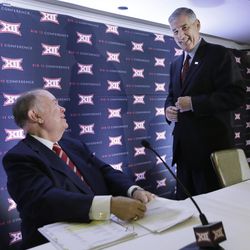 Big 12 Commissioner Bob Bowlsby, right, and University of Oklahoma President David Boren smile after speaking to reporters at the Big 12 sports conference meetings in Irving, Texas, Thursday, June 2, 2016. 