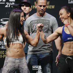 Tecia Torres and Michelle Waterson square off at UFC 128 weigh-ins.