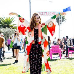 Why we love her look: Who would think to pair a kimono with a '70s velvet maxi? She did, and it's awesome.