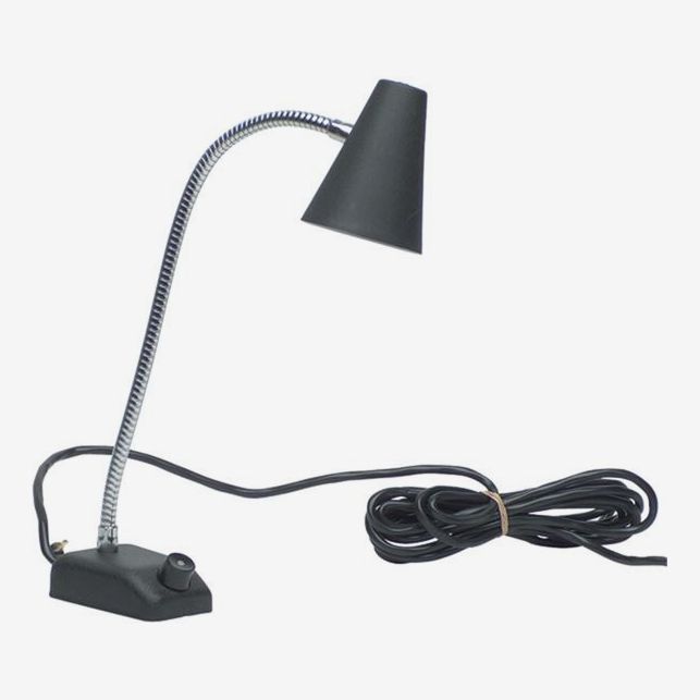 Dark gray lamp with small rectangular base. 