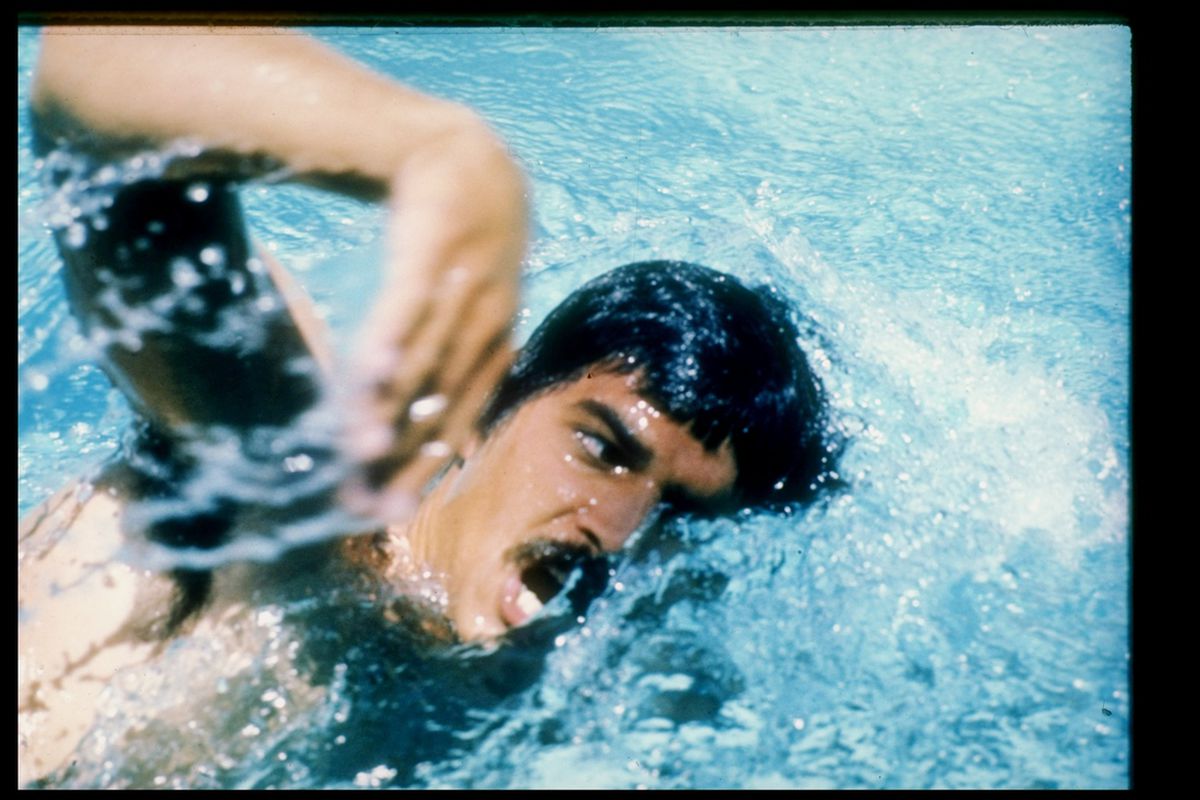 IU and Olympic legend Mark Spitz.  Mandatory Credit: Tony Duffy /Allsport (used via Getty Images subscription).  