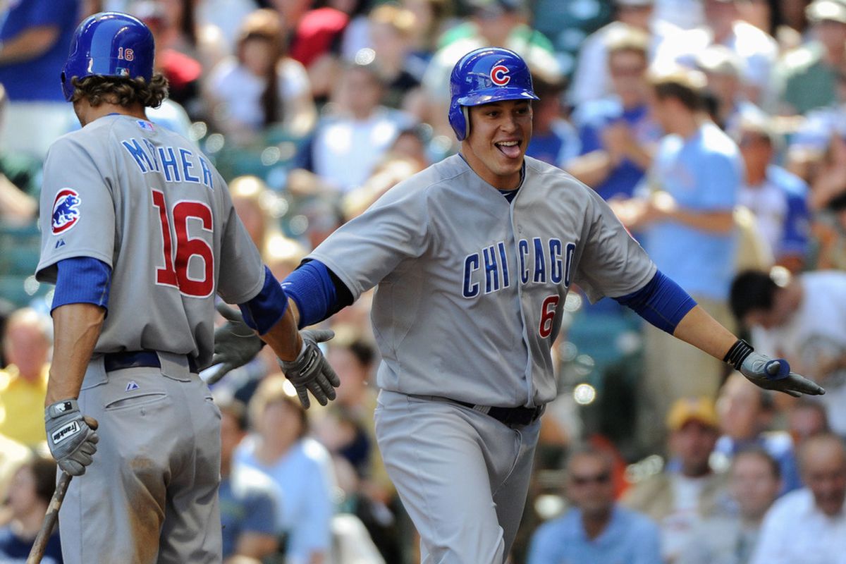 Happy times, for a time: Milwaukee, WI, USA; Chicago Cubs first baseman Bryan LaHair is greeted by center fielder Joe Mather  after hitting a two-run home run against the Milwaukee Brewers at Miller Park. Credit: Benny Sieu-US PRESSWIRE