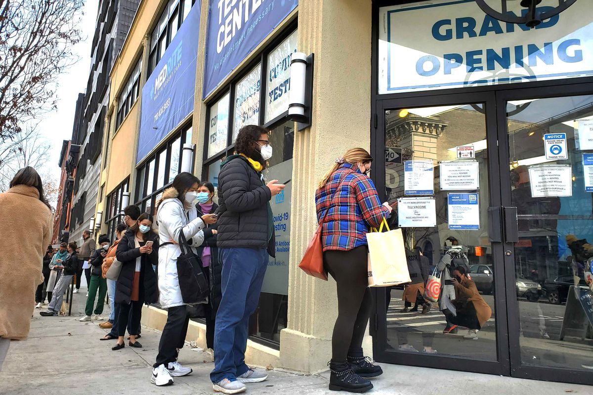 New Yorkers wait for a Covid test at MedRite in downtown Brooklyn, Dec. 16, 2021.