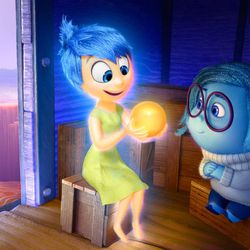 Joy (voice of Amy Poehler) and Sadness (voice of Phyllis Smith) catch a ride on the Train of Thought in Disney-Pixar's "Inside Out."
