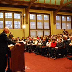 Elder Dallin H. Oaks of the Quorum of the Twelve Apostles speaks to Harvard University students at the 300-seat room inside the Ames Courtroom at Austin Hall Friday. The audience was comprised largely of students at Harvard Divinity School and Harvard Law School. 