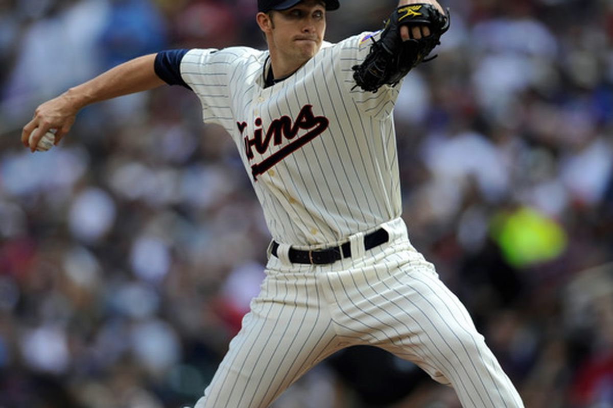 MINNEAPOLIS, MN - JUNE 11: Scott Baker #30 of the Minnesota Twins pitches against the Texas Rangers during the first inning of their game on June 11, 2011 at Target Field in Minneapolis, Minnesota. (Photo by Hannah Foslien/Getty Images)