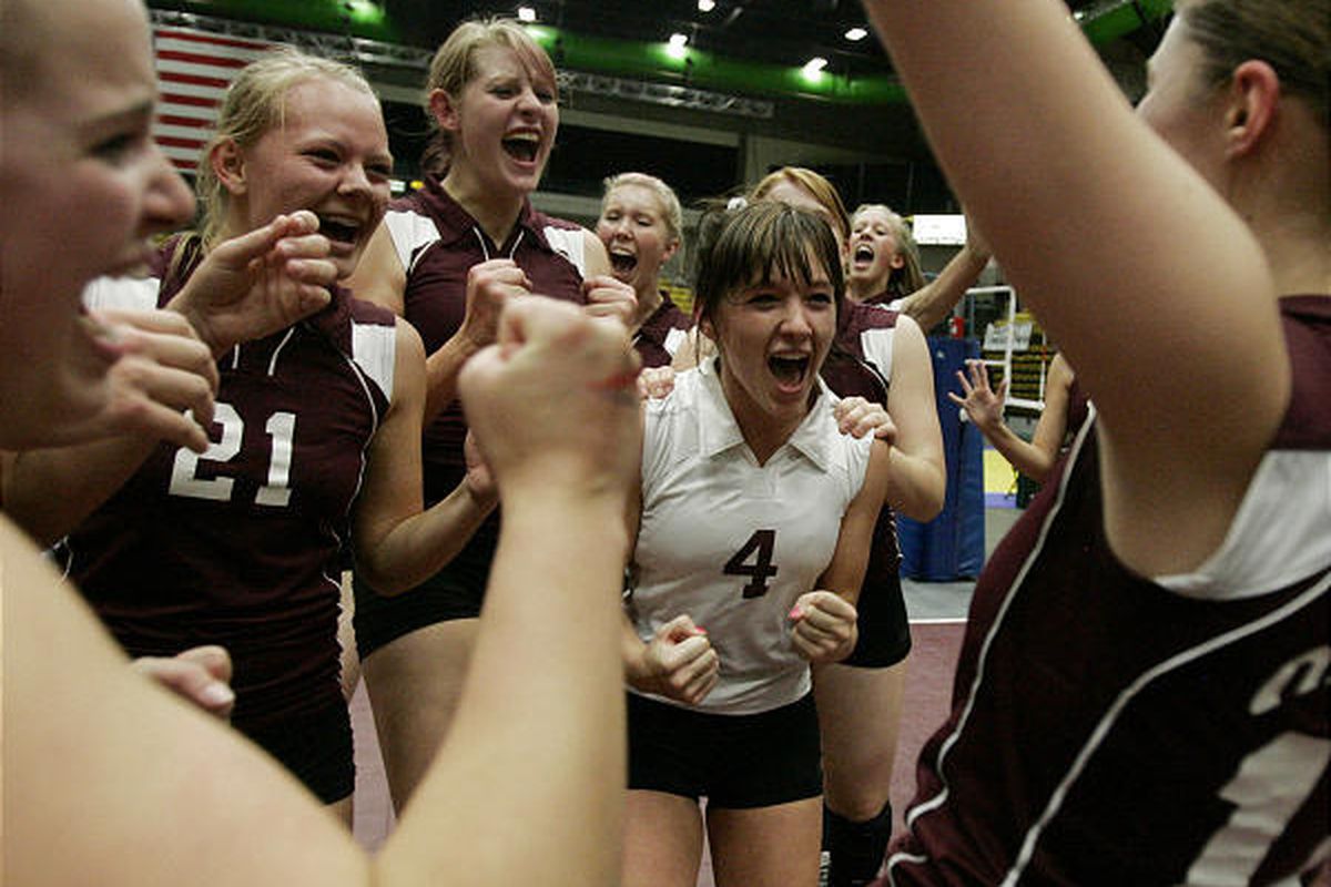 Mikelle Kap (4) lets out a yell after the final point as Morgan defeats Carbon for the 3A volleyball championship on Saturday.