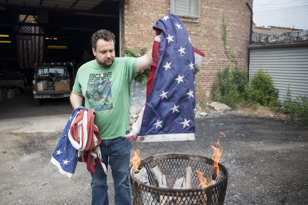 Carl “Gus” Porter III, CEO of W.G.N. Flag &amp; Decorating Co., retires some flags in accordance with the U.S. Flag Code, which states that worn-out flags “should be destroyed in a dignified way, preferably by burning.” W.G.N. Flag has the only city permi