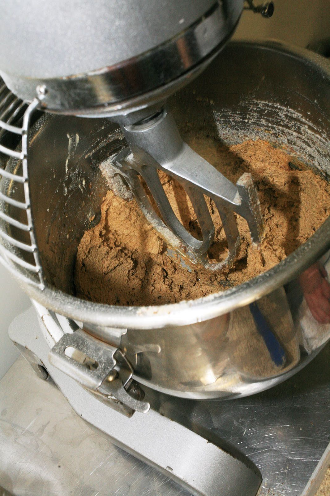 A stand mixer filled with brown sugar mix