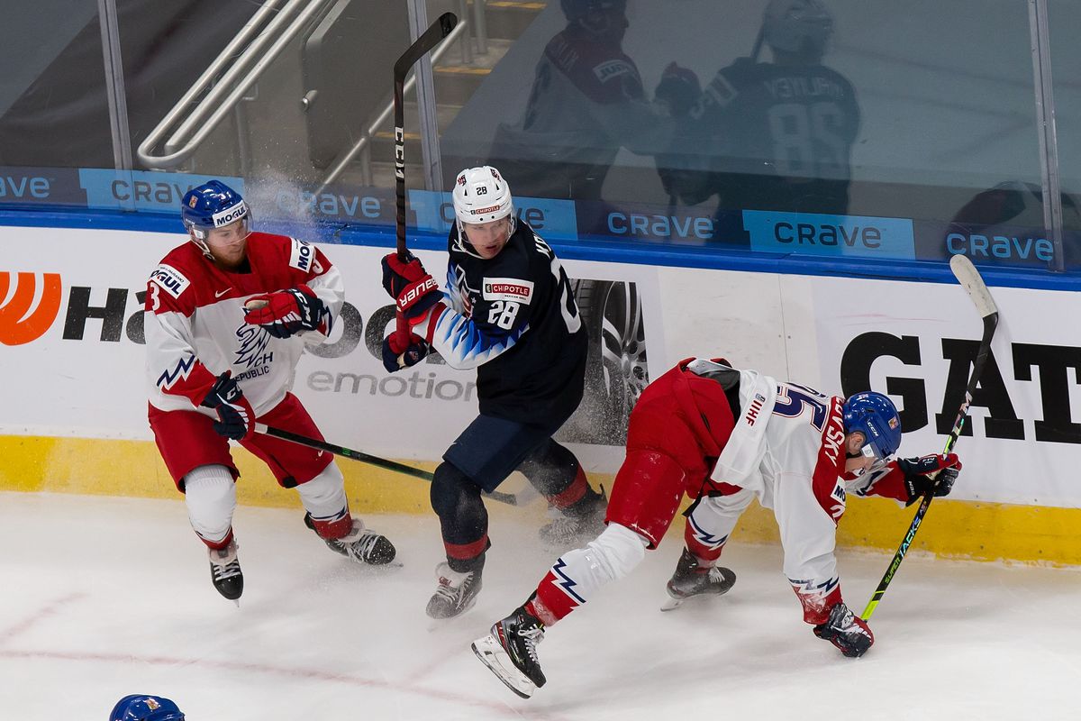 Arthur Kaliyev #28 of the United States skates against Karel Klikorka #3 and Jakub Rychlovsky #25 of the Czech Republic during the 2021 IIHF World Junior Championship at Rogers Place on December 29, 2020 in Edmonton, Canada.