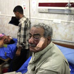 Injured victims receive treatment at a hospital after a car bomb outside Kut, 100 miles (160 kilometers) southeast of Baghdad, Iraq, Sunday, Jun 16, 2013. Most of the car bombs hit Shiite-majority areas and were the cause of most of the casualties, killing tens. The blasts hit half a dozen cities and towns in the south and center of the country. 