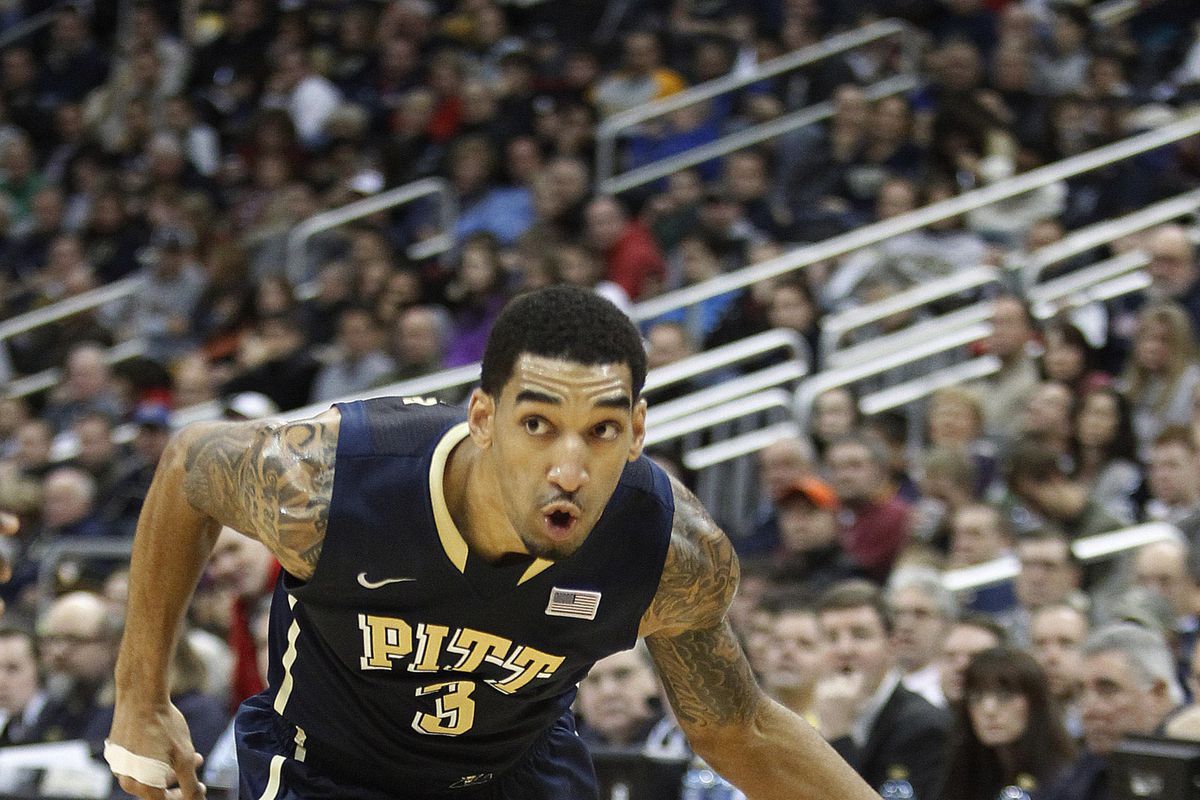 Pitt's Cameron Wright heads to the basket against Duquesne