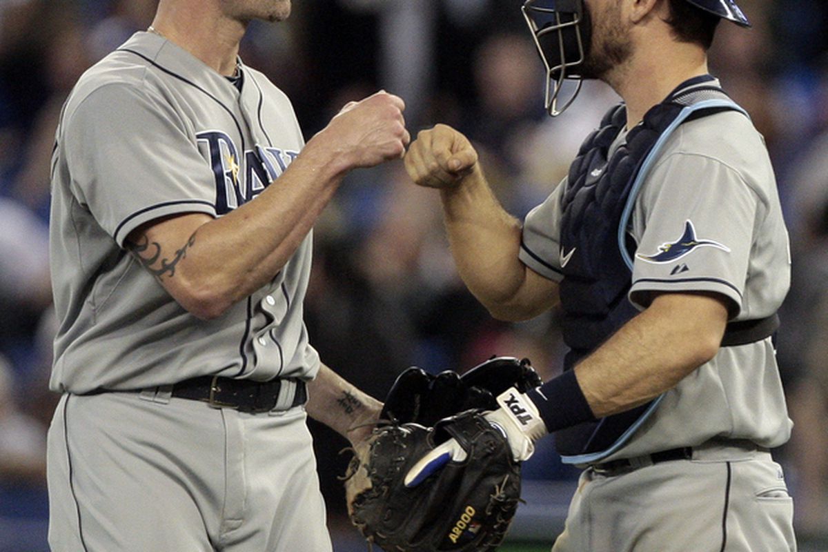 TORONTO, CANADA - MAY 18: Kyle Farnsworth #43 and John Jaso #28 of the Tampa Bay Rays celebrate win against the Toronto Blue Jays during MLB action at the Rogers Centre May 18, 2011 in Toronto, Ontario, Canada. (Photo by Abelimages/Getty Images)