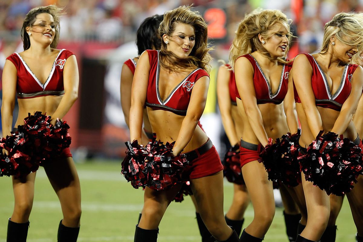 TAMPA, FL - AUGUST 27:  The cheerleaders of the Tampa Bay Buccaneers perform during a preseason game against the Miami Dolphins at Raymond James Stadium on August 27, 2011 in Tampa, Florida.  (Photo by J. Meric/Getty Images)
