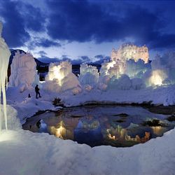 Brent Christensen's gigantic ice castles stand in Midway. Tourists may walk through for $2.