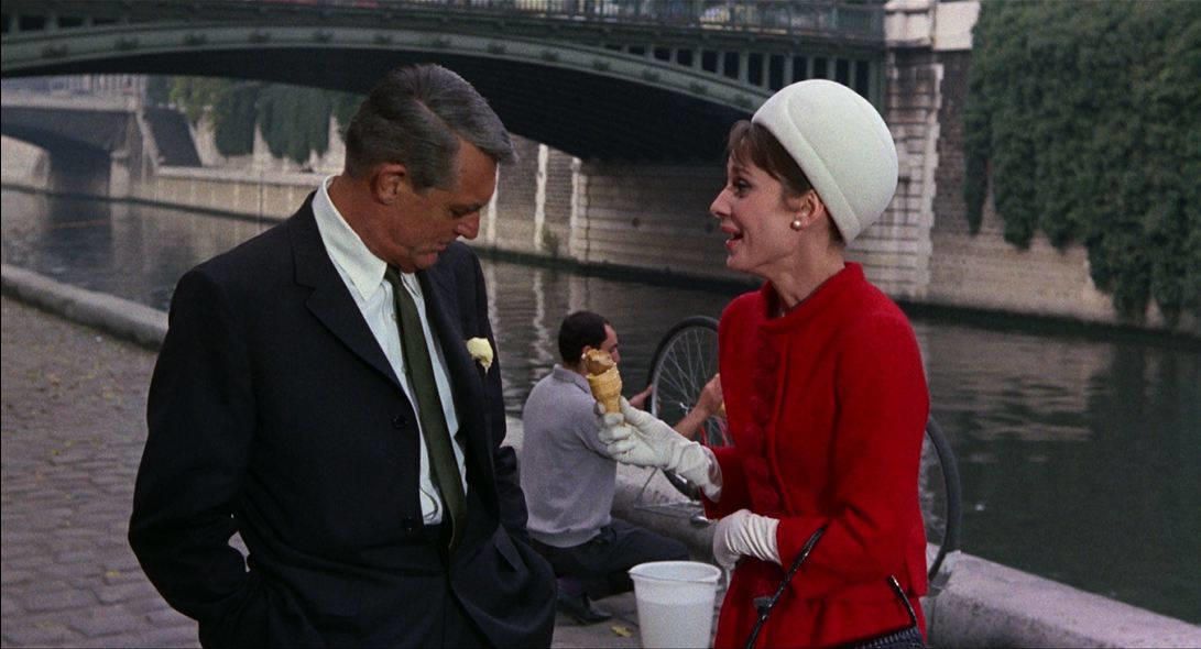 Audrey Hepburn spills a scoop of ice cream on Cary Grant’s suit in the comedy-thriller “Charade” (1963), to play at local Cinemark theaters in March.