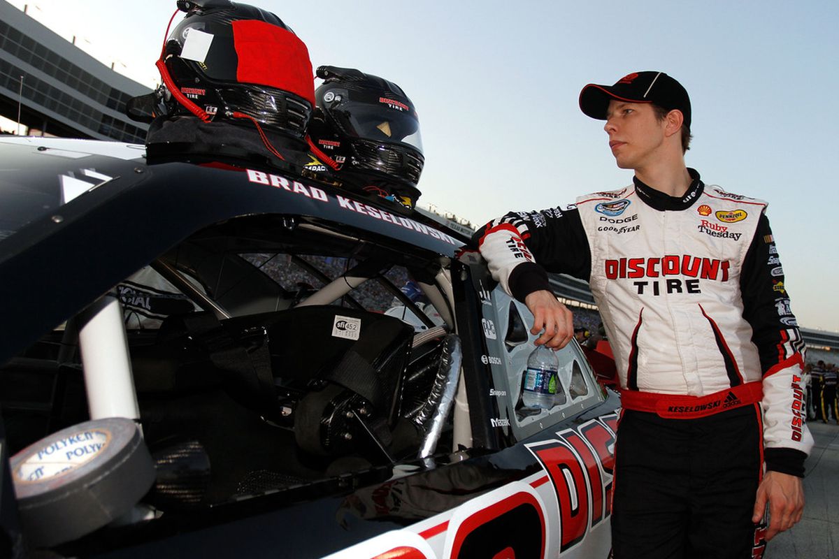 Brad Keselowski stands on the grid before the NASCAR Nationwide Series O'Reilly Auto Parts 300 at Texas Motor Speedway.