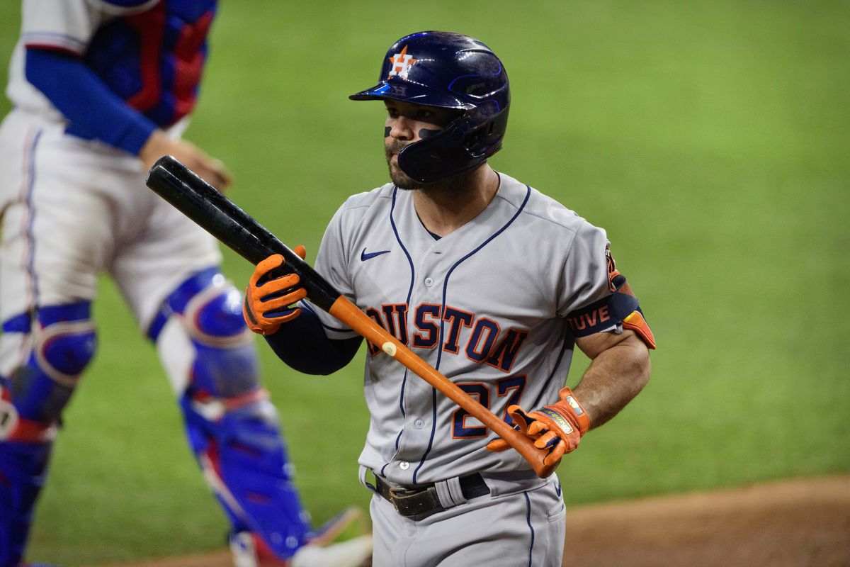 Houston Astros second baseman Jose Altuve strikes out against the Texas Rangers during the ninth inning at Globe Life Field.