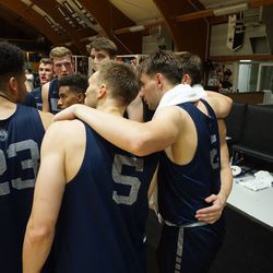 BYU players huddle during a recent four-game trip to Italy. 