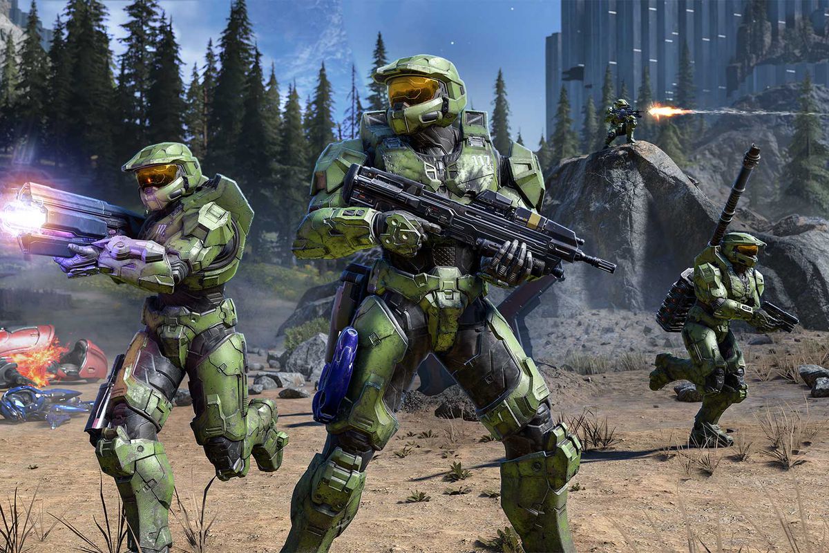 A group of Spartans (Master Chief) fight cooperatively in a still from Halo Infinite.
