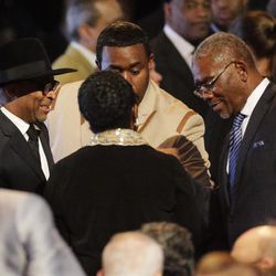 Spike Lee, left, speaks to other guests as they arrive for Muhammad Ali's memorial service, Friday, June 10, 2016, in Louisville, Ky. 