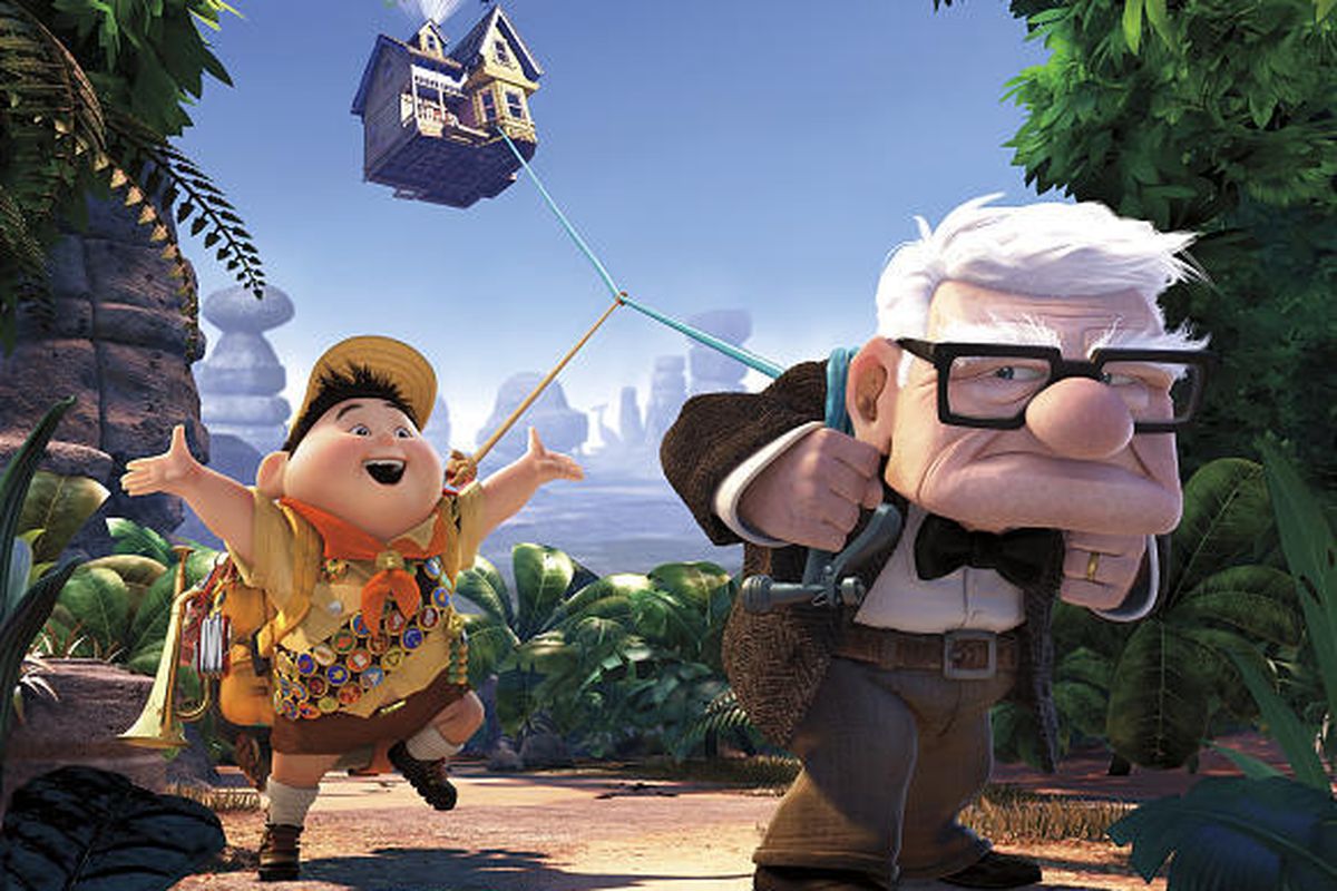 In this file film publicity image released by Disney/Pixar Films, animated characters Russell, left, and Carl Fredricksen are shown in a scene from the film, "Up."  