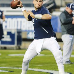 Brigham Young Cougars quarterback Tanner Mangum (12) warms up prior to the game with the Boise State Broncos in Provo on Friday, Oct. 6, 2017.