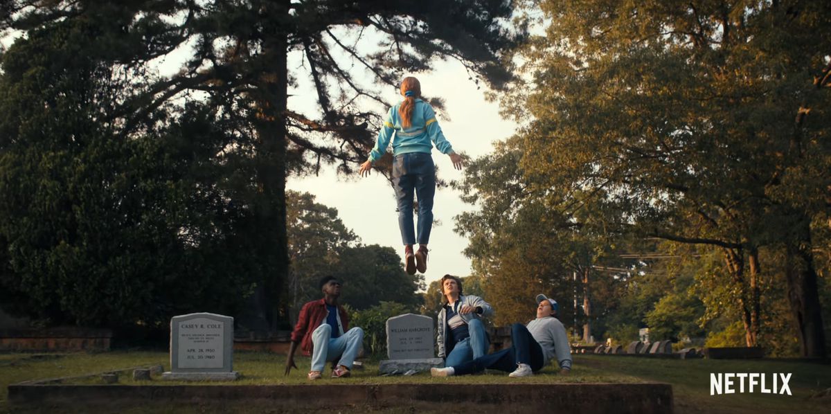 One of the characters from Stranger Things levitating over her brother’s grave.