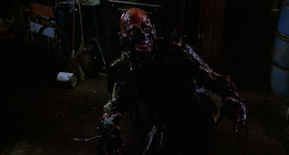 A shivering zombie in The Return of the Living Dead (1985)