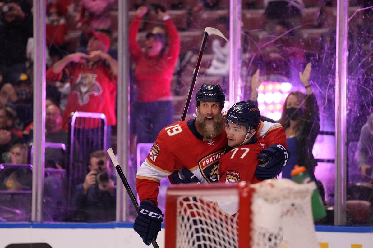 Oct 25, 2021; Sunrise, Florida, USA; Florida Panthers left wing Frank Vatrano (77) celebrates his goal against the Arizona Coyotes with center Joe Thornton (19) during the second period at FLA Live Arena.