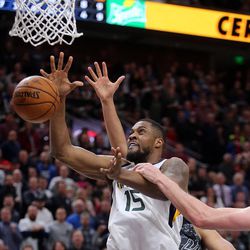 A foul is called on San Antonio Spurs as Utah Jazz forward Derrick Favors (15) drops the ball during a basketball game at the Vivint Smart Home Arena in Salt Lake City on Monday, Feb. 12, 2018. The Jazz won 101-99.